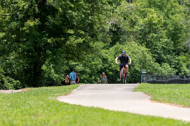 The Mill Creek Greenway has a wide, paved trail, that is excellent for walking or biking.