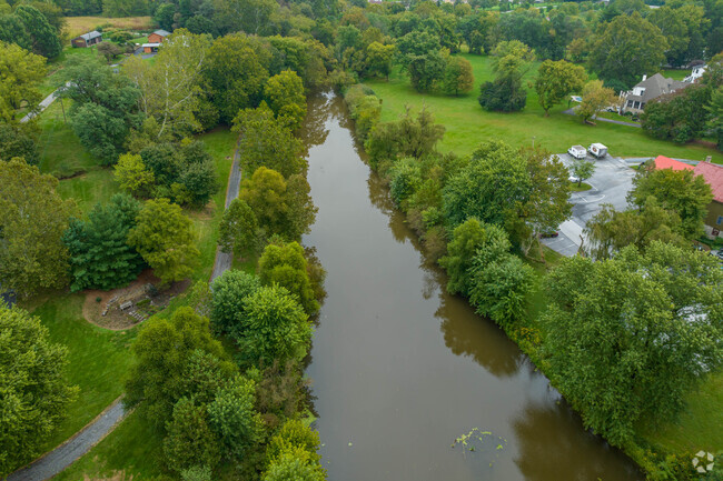 Follow the walking trails along the river at Flory Park in Fertility.