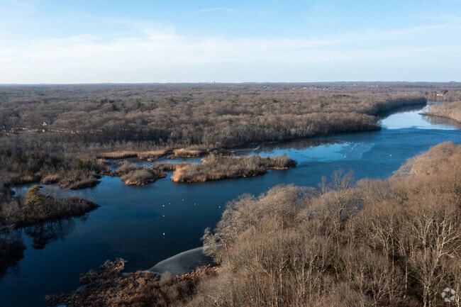 Stump Pond in Hauppauge reflects calm waters near Blydenburgh County Park.