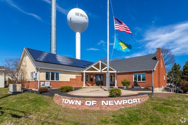 Newport Town Hall sits atop a hill and over looks the town and nearby DE-141.