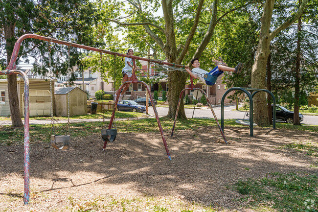 Swings are always a popular attraction for kids such as these at the Bethlehem Rose Garden.