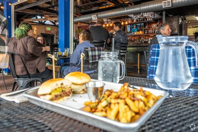 Grab a bite while shopping at Gilman Village, the commercial heart in the Gilman neighborhood.