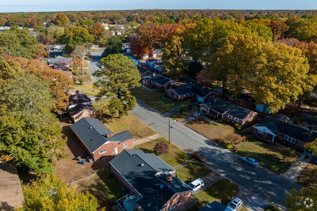 Homes line a peaceful street in the Ivy Farms community of Newport News.