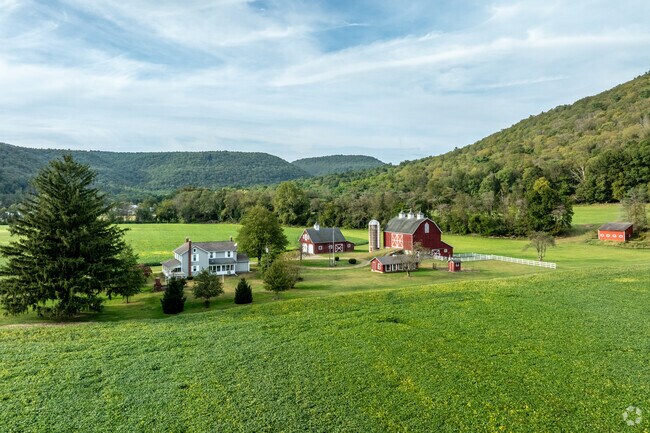 Homes in Gamble are surrounded by picturesque farms, offering a peaceful rural setting.