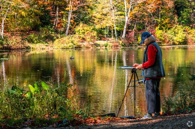 Local artist take in the scenic views at nearby Mills Creek Park.