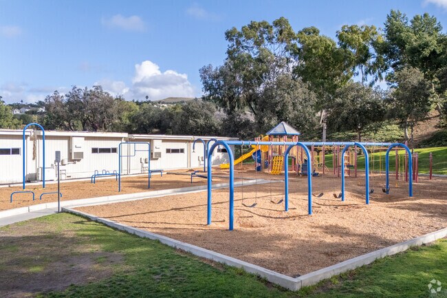 Your kids will love the fancy swing set and playground at Truman Benedict Elementary School.