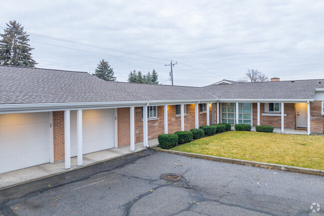 Saint Charles Catholic School features a smaller brick building for its students.