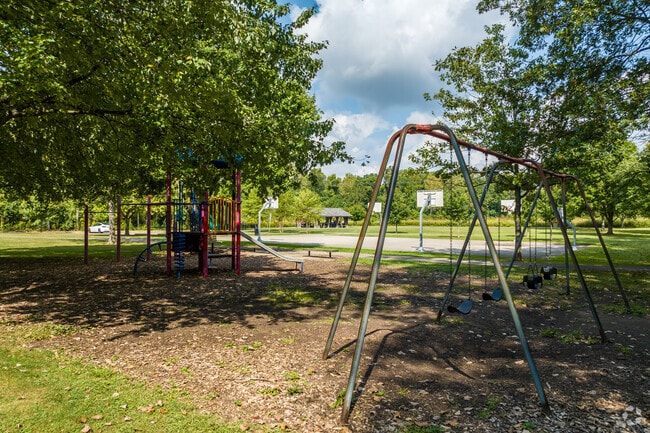 Well maintained playground equipment is offered at Elk Run Park.
