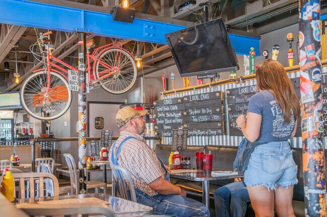 Flatire Burgers near College View is a bike-themed hangout with a collegiate vibe.
