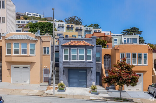 Many homes in the Sunnyside neighborhood feature garages on the ground floor.