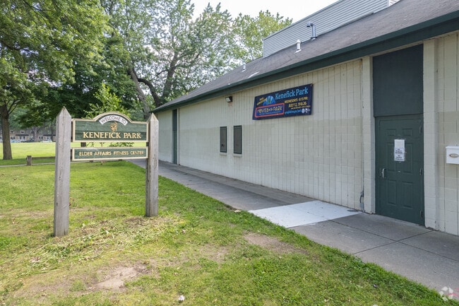 Kenefick park sign invites residents to the 12 acre greenspace.