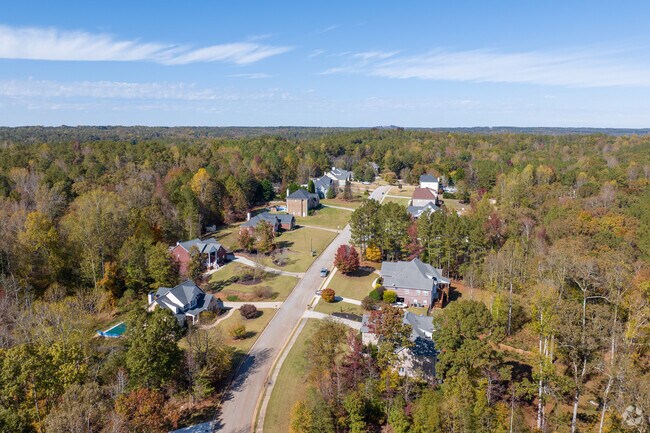 Abilene homes are established in the rather untouched natural tree landscape of the area.