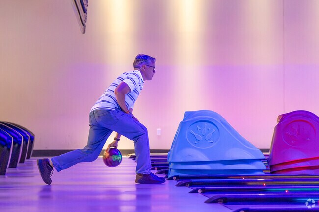 Active Stoneybrook-Brigadoon residents head to Main Event for bowling and arcade games.