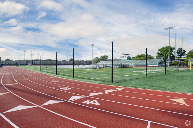 Graduation is held on the football field at the Howitt Middle School in Farmingdale, NY.