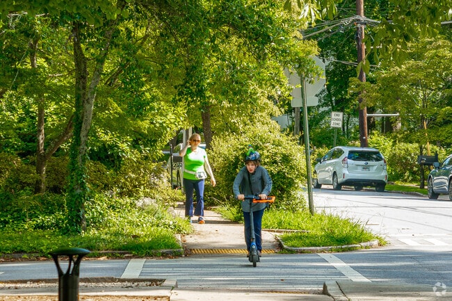 Winnona Park Historic District is an active neighborhood with residents out walking, scooting, and biking.