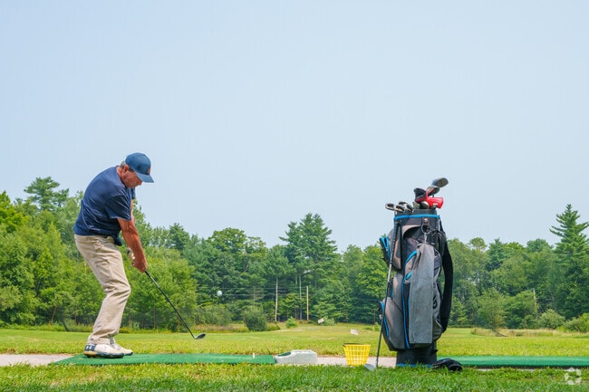 Practice your swing before heading out on the course at the Loudon Country Club.