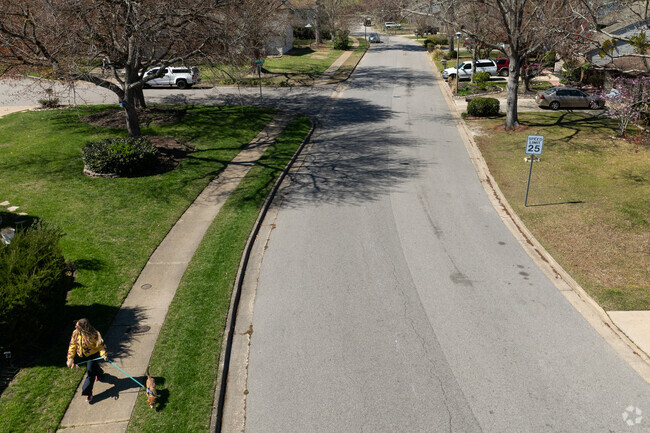 Residents of Lake Christopher often walk their dogs along the lake loop.​