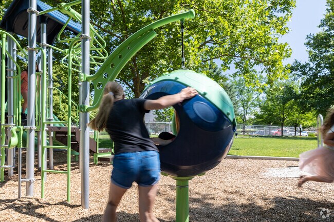 The swinging egg chair at 8th Street Park makes kids giddy (and dizzy) near Downtown Meridian.