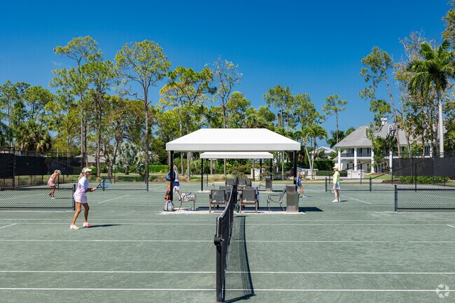 Quail Creek residents love to play a game of tennis with friends on the open courts.
