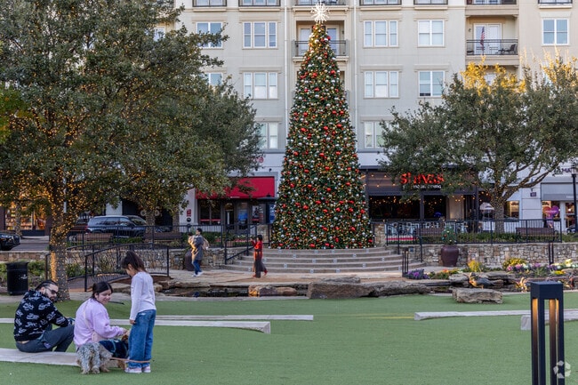 Locals head to Watters Creek for the Light the Night Christmas event in Allen.