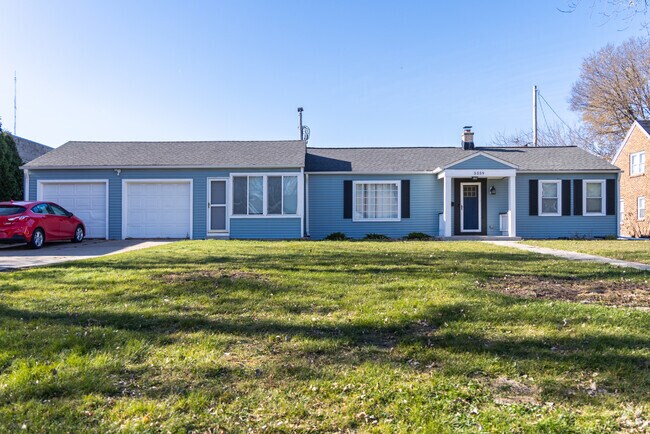 Ranch-style homes line Parkway’s residential streets near local parks.
