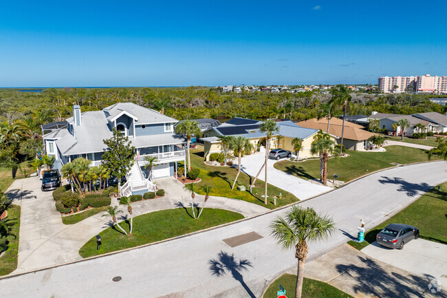 You can see the Gulf from the top deck of this new custom home in New Port Richey West.