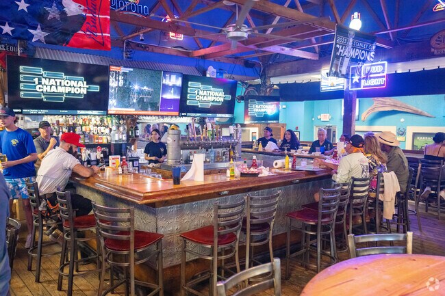 Local bars are a popular after hours place to unwind and watch a football game in South Padre Island.