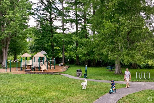 Carolina Place Playground features paved walkways perfect for riding your bike.