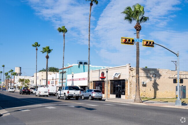 Palm trees line the streets of S Texas Blvd in downtown Weslaco.