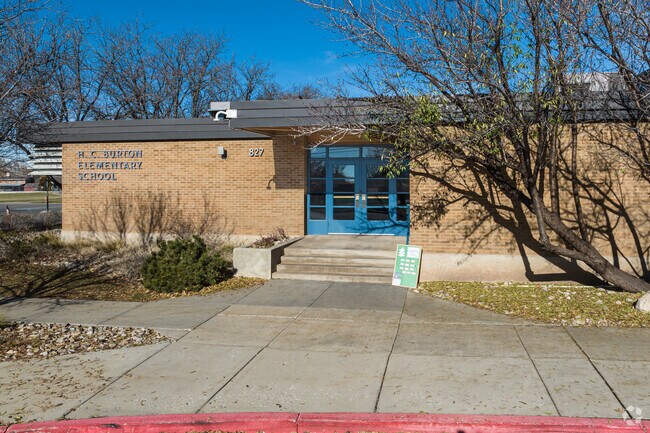 Blue double doors at H.C. Burton Elementary School in Fruit Heights welcome students to school.