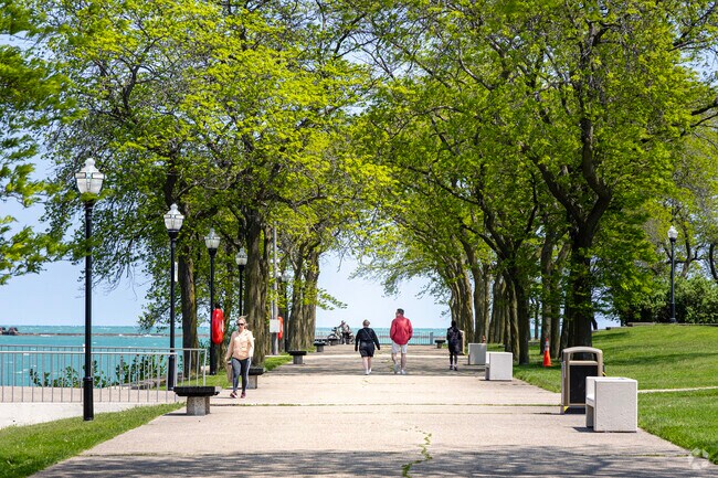 Milton Lee Olive Park is a tree covered walk way along the shores of Lake Michigan.