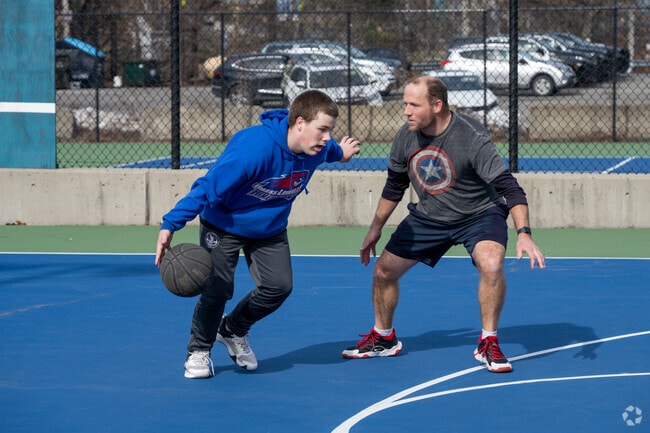 Hoopsters battle it out on a court in Pakachoag.