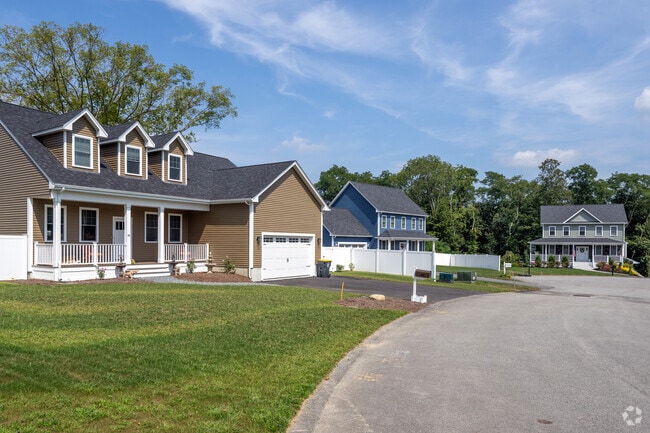 A row of new homes in Pottersville features classical styling.