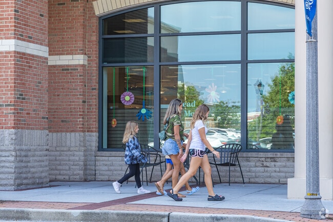 A family from Seagate South escapes the heat at the Barnes and Noble bookstore.