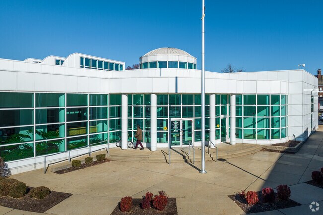 Julia Davis St Louis Library features a modern architectural design featuring white pillars.
