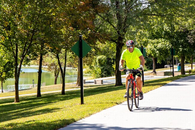 Glenn Cunningham Lake has a paved path that encircles the entire lake.