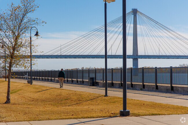Residents of Alton enjoy the walking paths along the Mississippi River.