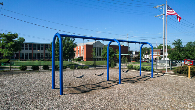 Clinton Elementary School can enjoy recess on the school swing set.