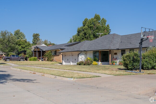 Roberts-Crest homes sit on cozy lots with mature trees and fenced backyards.