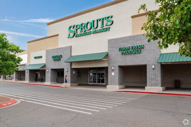 Four Hills Village presents abundant shopping options, including Sprouts Farmers Market.