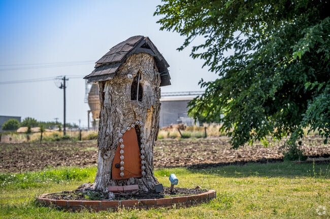 A tree stump was turned into a large birdhouse in front of a Biggs resident's home.