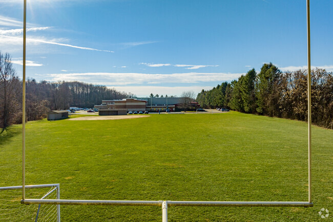 Jeannette Senior High School has a large grass field for sports practice.