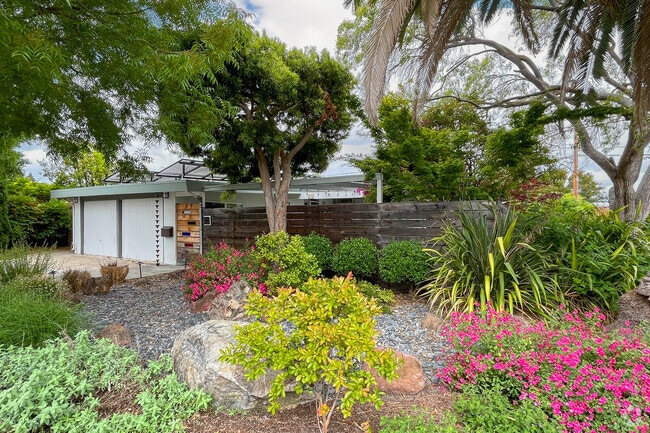 Colorful front lawns are dotted around the neighborhood of Monta Loma.