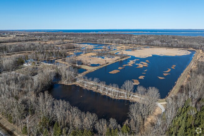 Barkhausen Waterfowl Preserve features marshes, ponds, and 9 miles of trails.