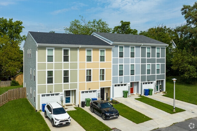 Newly built townhomes feature contemporary trends like neutral colors and symmetrical patterns.