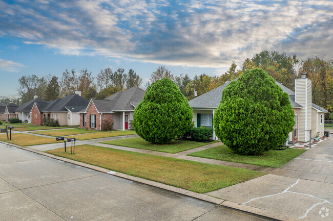A row of homes sit along a quiet cul-de-sac road in central Gardere.