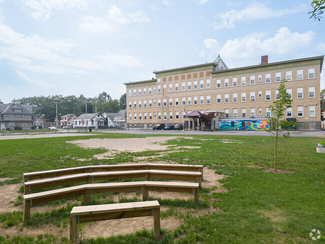 Lincoln Elementary Community  School has s large field out front for kids to run free in.