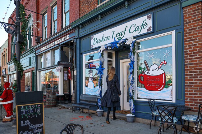 A customer enters Broken Leaf Cafe, in downtown Newton Falls.