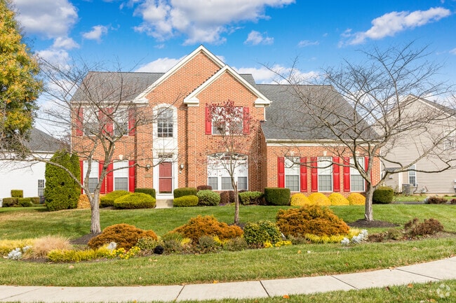 Immerse yourself in timeless elegance, Mitchellville's exquisite Craftsman style home awaits.