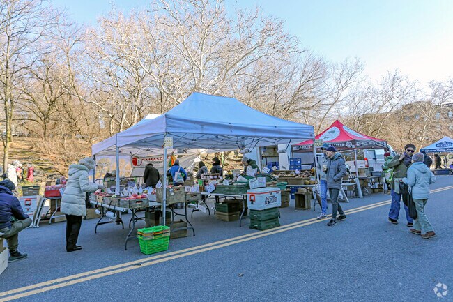 Residents of the Inwood neighborhood enjoying the Greenmarket fair on Saturday afternoons.